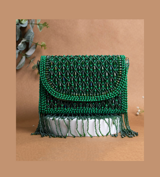 dark green handbag with pearls and tassels#color_dark-green