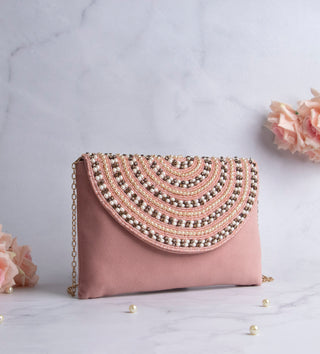 impressive blush clutch with embellished pearls#color_blush