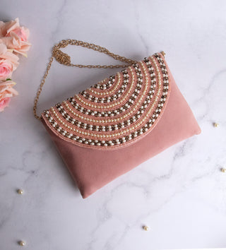 impressive blush clutch with embellished pearls#color_blush