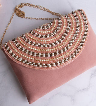 impressive blush clutch with embellished pearls#color_blush