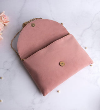 impressive blush clutch with embellished pearls#color_blush