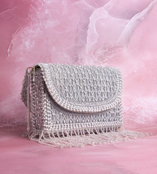 white handbag with pearls and tassels#color_white