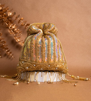 glamorous golden potli bag with tassels and pearls#color_gold