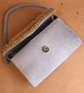 grey handbag with small gold beaded crystal#color_grey
